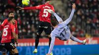 Barcelona meraih kemenangan 1-0 atas Real Mallorca pada laga pekan ke-19 La Liga di Camp Nou, Senin (3/1/2021) dini hari WIB. Gol tunggal kemenangan Barca disarangkan Luuk de Jong pada menit ke-44. (AFP/Jaime Reina)