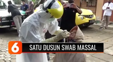 Dipicu prosesi pemakaman jenazah korban Covid-19, warga di Srandakan, Bantul, Daerah Istimewa Yogyakarta, harus menjalani tes swab massal. Langkah ini dilakukan karena saat pemakaman, warga tidak menerapkan prosedur pemakaman jenazah Covid-19, warga ...