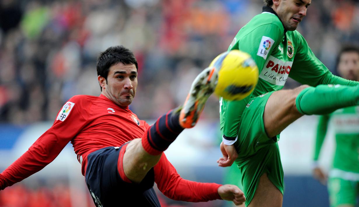 Javad Nekounam, pemain asal Iran yang bersinar di Piala Dunia 2006 ini bergabung dengan Osasuna pada tahun 2006-2012. (AFP/Ander Gillenea)