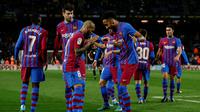 Barcelona membungkam Osasuna empat gol tanpa balas pada laga pekan ke-28 La Liga di Camp Nou, Senin (14/3/2022) dini hari WIB. (AP Photo/Joan Monfort)