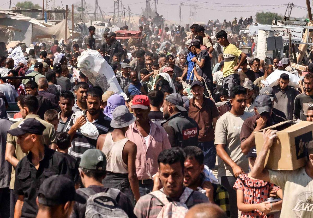 FOTO:  Israel Umumkan Jeda Taktis, Truk Bantuan Mulai Masuk Gaza