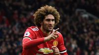 AC Milan dikabarkan sudah membuka pembicaraan dengan pihak Marouane Fellaini perihal kemungkinan transfer pada musim panas 2018. (AFP/Paul Ellis)