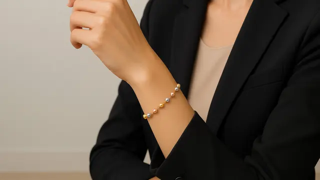 Model Gelang Emas Elegan 2 Gram dengan Bola Kecil Tren 2025/ Ilustrasi oleh AI