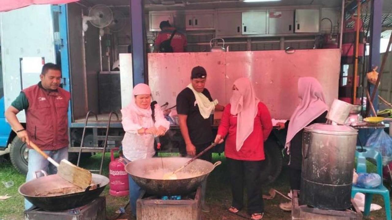 Dinsos Aceh Tenggara Salurkan Ribuan Nasi Bungkus untuk Korban Bantuan Banjir Aceh Tenggara