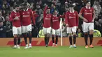 Gelandang Manchester United, Casemiro (18) merayakan dengan rekan setimnya setelah mencetak gol ke gawang Reading selama pertandingan putaran keempat Piala FA di Old Trafford di Manchester, Inggris, Minggu (29/1/2023). Casemiro mencetak dua gol dan mengantar MU menang atas Reading 3-1. (AP Photo/Rui Vieira)