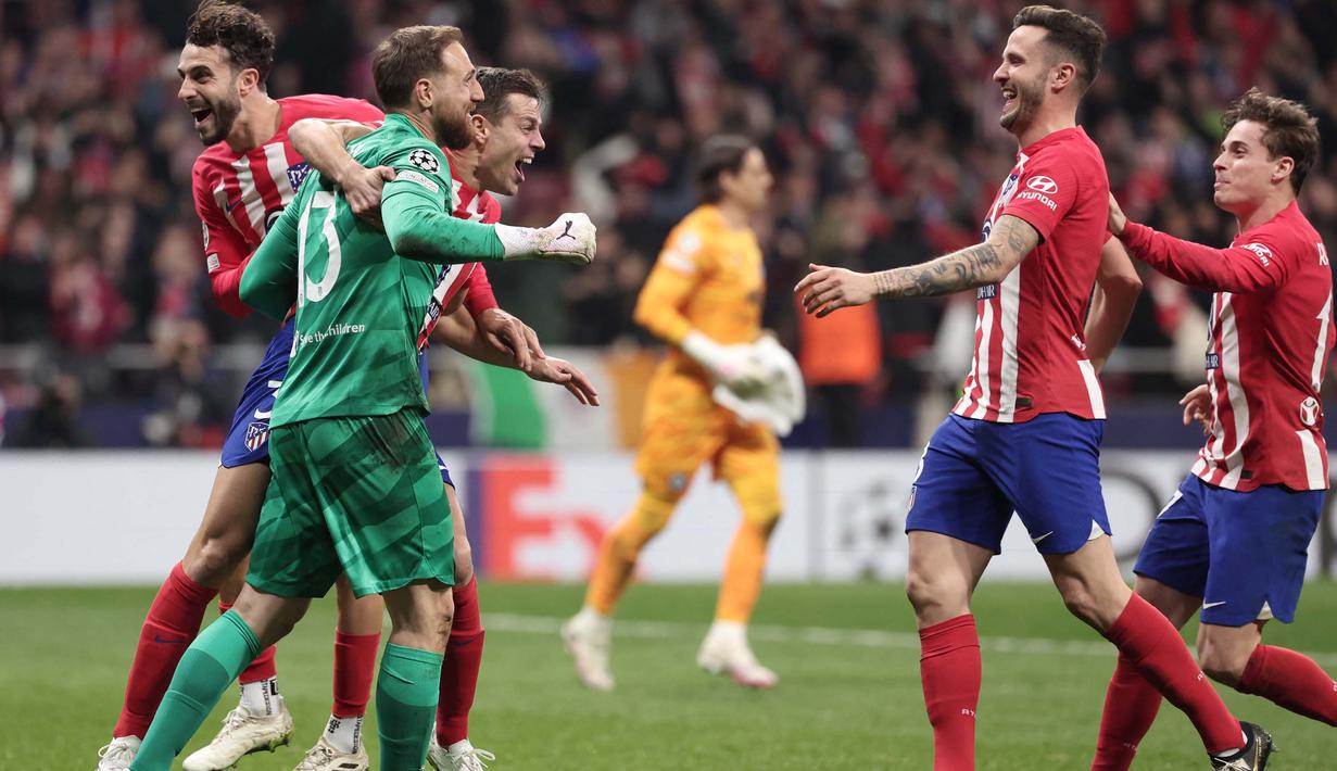 Atletico Madrid berhasil menyingkirkan Inter Milan usai menang 2-1 (3-2 penalti). (Thomas COEX/AFP)