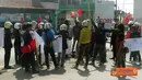 Citizen6, Sidrap: Mereka melakukan aksi demo dengan memulainya di Bundaran Jam Kota Pangkajene dan mengarah ke Gedung DPRD Jalan Jendaral Sudiriman. (Pengrim: Sidrap)