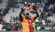 Penyerang Galatasaray asal Nigeria bernomor punggung 45, Victor Osimhen, merayakan golnya setelah pertandingan leg kedua babak play-off babak gugur Liga Champions antara Juventus FC dan Galatasaray SK di stadion Allianz di Turin, pada 26 Februari 2026.
(Isabella BONOTTO/AFP)