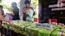 Barang bukti kasus narkotika jenis sabu diperlihatkan saat konferensi pers di Mabes Polri, Jakarta, Rabu (22/2/2023). Adapun total barang bukti sitaan 220 kilogram sabu dan 705 butir ekstasi dengan tujuh tersangka. (Liputan6.com/Angga Yuniar)