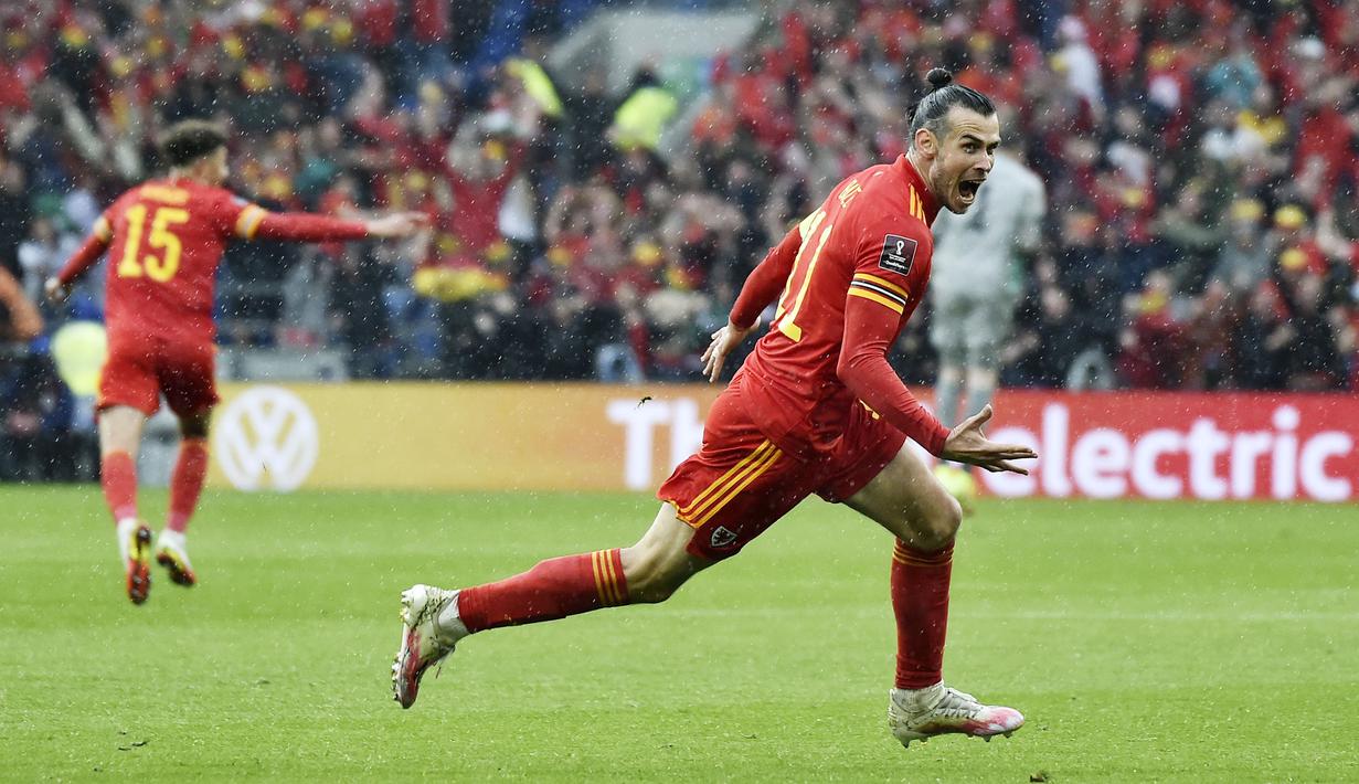 Wales menjadi negara zona Eropa terakhir yang berhasil menyabet satu tiket lolos ke Piala Dunia 2022. Ini adalah kali pertama sejak 64 tahun lalu, Wales kembali menjadi tim peserta di Piala Dunia. (AP/Rui Vieira)
