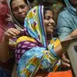 Keluarga Zulfiqar Ali di Lahore, Pakistan, bergembira menyambut pembatalan eksekusi mati, Jumat (29/7/2016). (BBC)