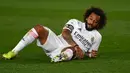 Marcelo. Bek kiri Brasil berusia 33 tahun ini didatangkan Real Madrid dari Fluminense pada tengah musim 2006/2007. Ia menjabat kapten utama Bianconeri sejak awal musim 2021/2022 ini usai kepergian Sergio Ramos. Musim ini ia baru bermain dalam 7 laga di semua ajang. (AFP/Gabriel Bouys)