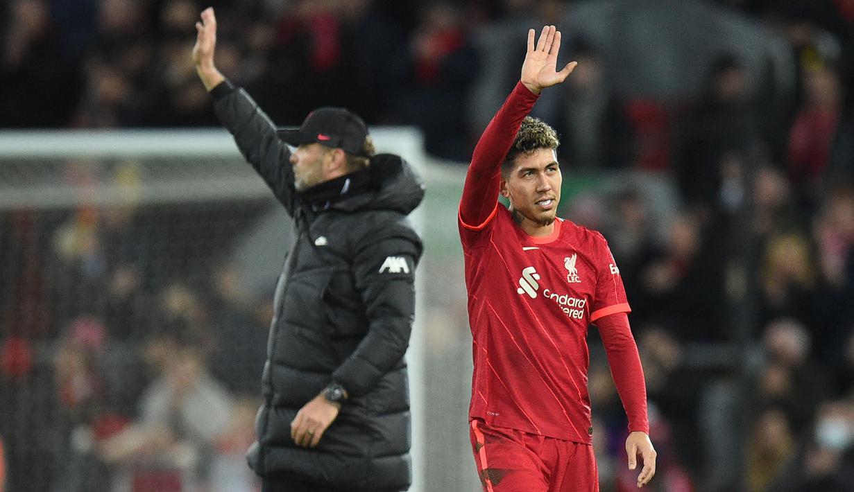 Di bawah manajemen Klopp, Roberto Firmino tumbuh menjadi penyerang yang luar biasa di Liverpool. Ia memiliki kecerdasan, antisipasi, dan kemampuan mencetak golnya yang bagus. Saat ini, Firminho telah melesatkan 94 gol dan 73 assist dalam 312 penampilannya bersama The Reds. (AFP/Oli Scarff)