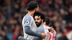 2. Mohamed Salah (Liverpool) - 10 Gol. (AFP/Glyn Kirk)