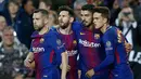 Pemain Barcelona merayakan golnya saat melawan AS Roma pada pertandingan Liga Champions di stadion Camp Nou di Barcelona (4/3). Barcelona menang 4-1 ketika menjamu AS Roma. (AP Photo / Manu Fernandez)