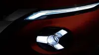 Teaser lampu depan mobil yang diyakini Nissan Juke terbaru. (Mobil1)
