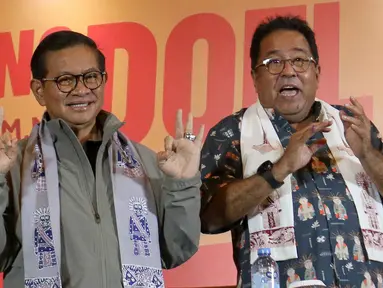 Calon gubernur dan wakil gubernur DKI Jakarta nomor urut 3, Pramono Anung (kiri) bersama Rano Karno saat menyampaikan keterangan terkait hasil hitung cepat pada Pemilihan Kepala Daerah (Pilkada) Serentak 2024 di Jakarta, Rabu (27/11/2024). (Liputan6.com/Herman Zakharia)