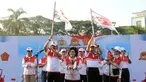 Kapolri Jenderal Polisi Tito Karnavian dan Panglima TNI Hadi Tjahjanto melepas jalan sehat dalam rangka HUT Bhayangkara ke-73 di kawasan silang Monas, Jakarta, Minggu (7/7/2019). Jalan sehat bersama jajaran TNI-Polri dan masyarakat diikuti ribuan peserta. (Liputan6.com/HO/Bayu)