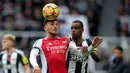 Bermain di kandang lawan, Tim Meriam London mendapat perlawanan sengit tuan rumah sejak bola digulirkan. Ketika pertandingan baru berjalan 12 menit, gawang Arsenal sudah dibobol Newcastle United melalui tandukan Alexander Isak. (Owen Humphreys/PA via AP)