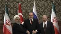 Presiden Iran Hassan Rouhani, Presiden Turki Recep Tayyip Erdogan, dan Presiden Vladimir Putin bertemu di Ankara untuk membahas isu Suriah
