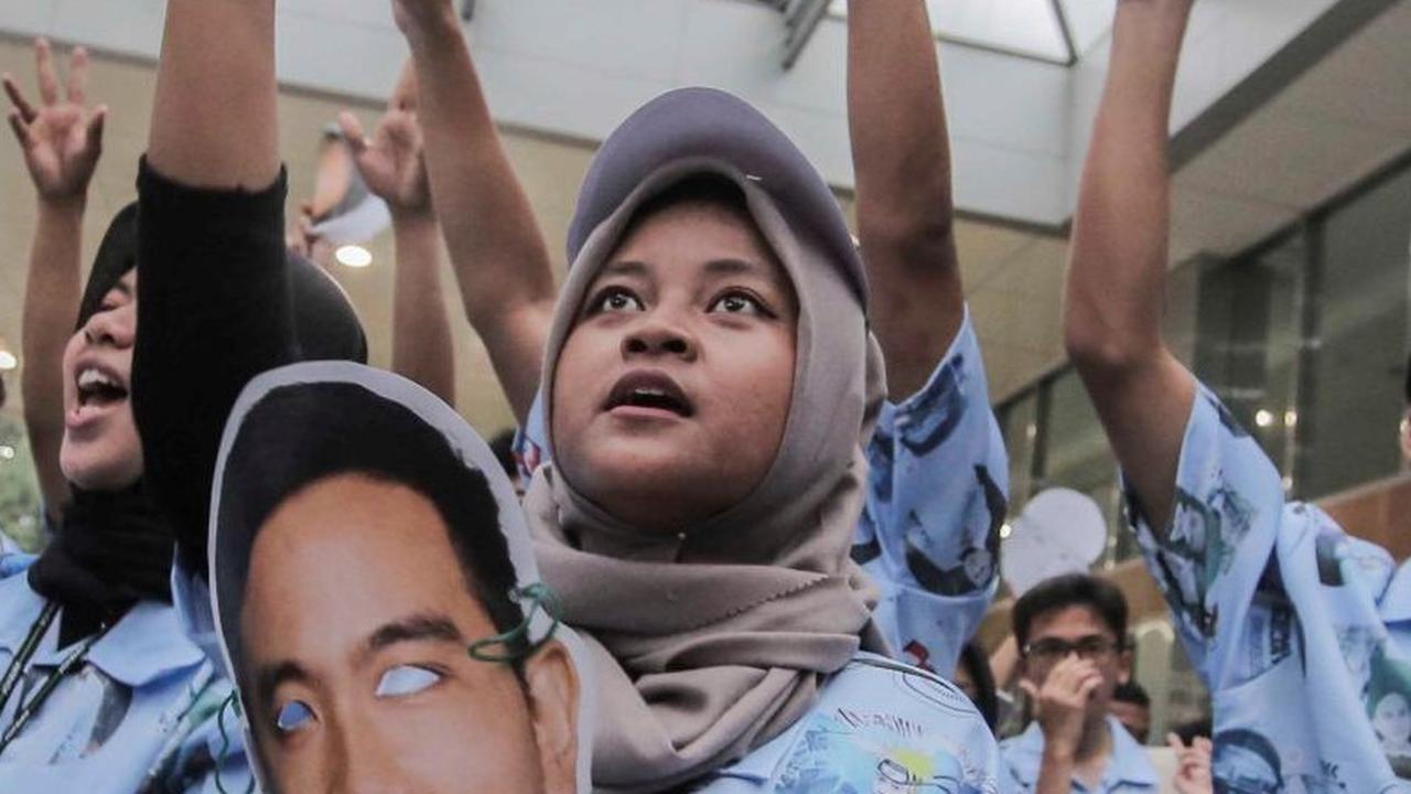 FOTO: Kaum Milenial Pendukung Capres dan Cawapres Mendominasi Jelang Debat Keempat Pilpres 2024
