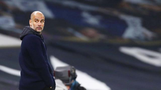 Foto Liga Inggris: Ekspresi Pep Guardiola Saat Manchester City Terkapar di Markas Tottenham Hotspur
