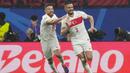 Selebrasi bek Timnas Turki, Merih Demiral (kanan) bersama rekannya, Salih Ozcan setelah mencetak gol kedua ke gawang Timnas Austria pada laga babak 16 besar Euro 2024 di Red Bull Arena, Leipzig, Jerman, Rabu (3/7/2024). (AP Photo/Martin Meissner)