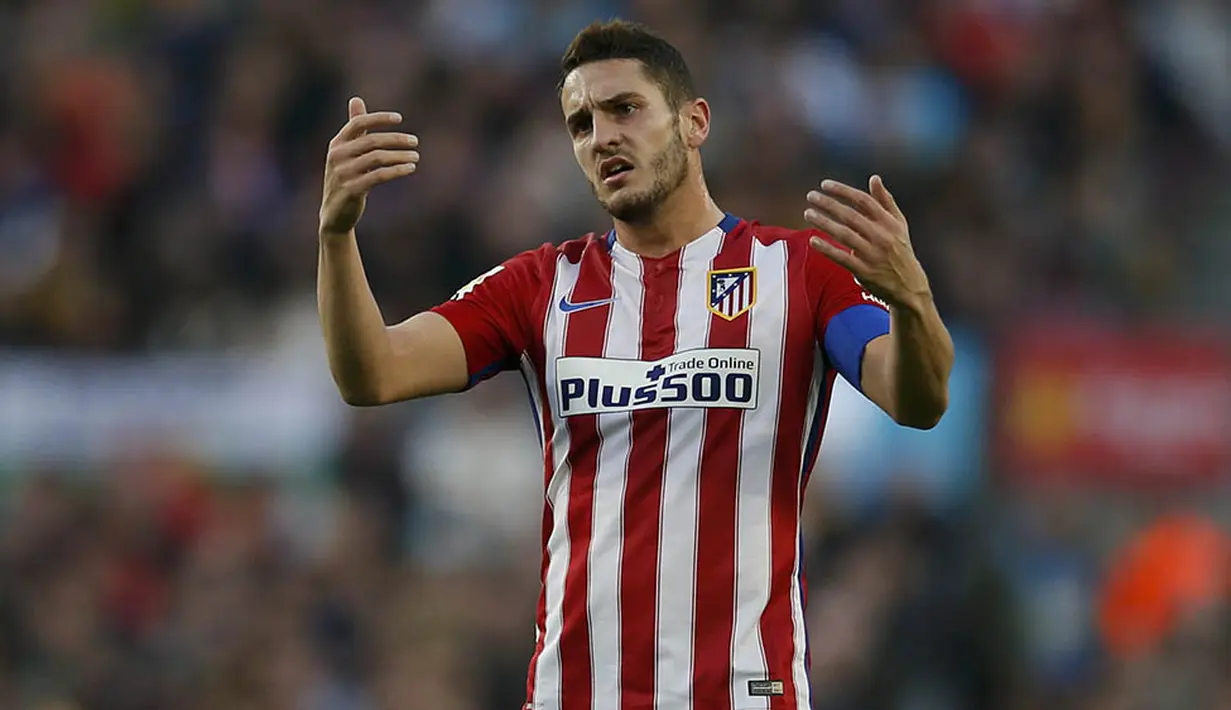 Gelandang Atletico Madrid, Koke, tampak kecewa usai kalah dari Barcelona. Barca menguasai jalannya pertandingan dengan penguasaan bola sebesar 64 persen. (Reuters/Albert Gea)