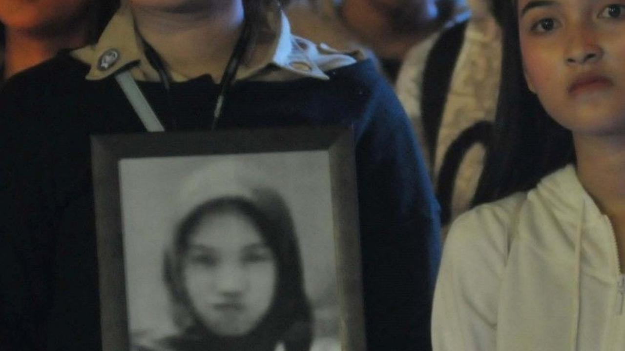 Dalam aksinya mereka membawa foto para korban dalam aksi tersebut. Foto: merdeka.com / Imam Buhori