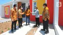 Wakil Dirut Bank BTN Nixon LP Napitupulu (tengah), Direktur Consumer and Commercial Lending Hirwandi Gafar (kedua kanan) berbincang dengan Kepala Bakorwil Malang Budi Sarwoto, Direktur Pelaksanaan PP Kementerian PUPR R.Haryo Bekti Martoyoedo di Pasuruan, Jawa Timur (15/10/2021).(Liputan6.com/HO/BTN)