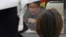 Korea Utara meluncurkan rudal balistik jarak jauh ke arah perairan timurnya pada hari Rabu, kata negara-negara tetangganya. (AP Photo/Eugene Hoshiko)
