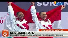 Sementyara medali emas direbut pasangan atlet renang Singapura.