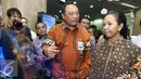 Menteri BUMN Rini M Soemarno menyimak penjelasan Dirut Bank BTN, Maryono saat acara HUT KPR BTN di Menara BTN, di Jakarta Selasa (14/12). Bank BTN menegaskan perannya sebagai Bank yang fokus pada pembiayaan perumahan. (Liputan6.com/Angga Yuniar)