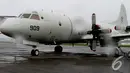 Penampakan pesawat dari Korea Selatan yang ikut membantu pencarian AirAsia QZ8501, Lanud Halim Perdanakusuma, Jakarta, Minggu (4/1/2015). (Liputan6.com/Andrian M Tunay)