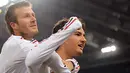 AC Milan's Brazilian Pato celebrates with teammate English midfielder David Beckham after scoring during his team's Italian Serie A football match against AS Roma on January 11, 2009 at Olympic stadium in Rome. AFP PHOTO / ALBERTO PIZZOLI