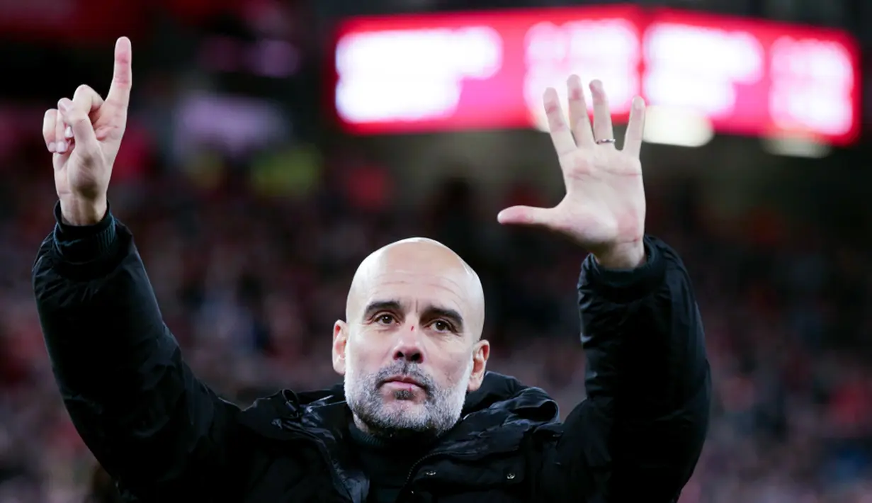 Pelatih Manchester City, Pep Guardiola, memberi respon menohok kepada penggemar Liverpool usai ia diejek dalam pertandingan antara City vs Liverpool pada Minggu (1/12/2024). (AP Photo/Ian Hodgson)
