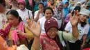 Pekerja Rumah Tangga dari Jambore Perempuan Pemimpin saat berorasi di depan Gedung Kementerian Pemberdayaan Perempuan, Jakarta, Senin (9/11). Mereka menuntut diakui sebagai pekerja yang dilindungi dan dipenuhi hak-haknya. (Liputan6.com/Faizal Fanani)
