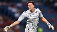 3. Wojciech Szczesny, dipinjamkan ke AS Roma, kiper asal Polandia ini berhasil tampil apik, namun kemungkinan dirinya akan menolak kembali ke Arsenal jika hanya menjadi pelapis Petr Cech. (AFP/Alberto Pizzoli)