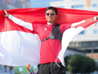 Riau Ega Agata Salsabilla sukses mempersembahkan medali emas keempat dari cabor panahan nomor recurve pada ajang SEA Games 2025 yang berlangsung di Bangkok, Thailand hari Rabu (17/12/2025). (Bola.com/Bagaskara Lazuardi)