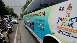  Keenam shuttle bus itu, yaitu di parkir IRTI Monas, Mangga Dua Square, Rusunawa Kemayoran, Stasiun KA Kemayoran, dan Hotel Holiday Inn, Jakarta, Rabu (11/6/2014) (Liputan6.com/Faizal Fanani)