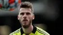 David De Gea masih kukuh mengawal gawang Manchester United hingga musim ini sejak didatangkan pada Juli 2011 dari Atletico Madrid meski belakangan sempat digoda untuk kembali ke LaLiga. Tercatat ia belum mampu digeser oleh 7 kiper pelapis Setan Merah. Siapa saja? (AFP/Adrian Dennis)