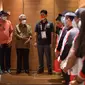 Sejumlah atlet Indonesia yang sudah bertanding di Olimpiade Tokyo dengan perolehan sementara tiga medali, pulang ke tanah air pada Kamis (29/7) dari bandara Narita Jepang. Foto KBRI Tokyo