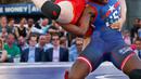 Tamyra Mensah pegulat asal AS bertarung melawan Miwa Morikawa asal Jepang pada pertandingan gulat "Beat The Streets" di Times Square, New York City, (17/5). (AP Photo/Kathy Willens)