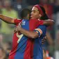 Ronaldinho dan Samuel Eto'o (LLUIS GENE / AFP)