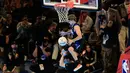 Aksi pemain Osceola Magic, Mac McClung saat kontes Slam Dunk di NBA All Star 2024 di Lucas Oil Stadium, Indianapolis, Amerika Serikat, Minggu (18/02/2024). (AFP/Getty Images/Justin Casterline)