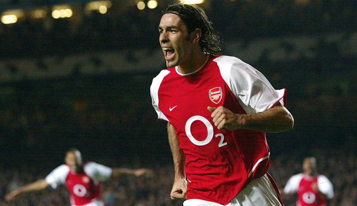 Robert Pires (81 laga di Champions) - Pires memiliki catatan laga yang cukup banyak di kompetisi Liga Champions. Dari 81 laganya, pemain asal Prancis ini belum pernah merasakan trofi juara Liga Champions. (AFP/Odd Andersen)