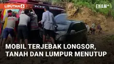 Longsor terjadi di Jalan Poros Desa Parakanbeusi, Bojongmanik, Lebak (19/12/2024). Material tanah dan lumpur menutup jalan, menghambat aktivitas warga