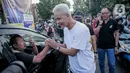 Sejumlah pengendara tampak melambaikan tangan dan menyapa Ganjar. (Liputan6.com/Faizal Fanani)