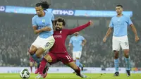 Kejar-mengejar gol terjadi pada laga ini. City tiga kali memimpin masing-masing berkat gol Erling Haaland, Riyad Mahrez, dan Nathan Ake. (AP Photo/Jon Super)