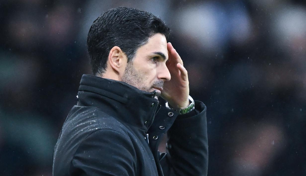 Hasil ini membuat Arsenal berada di posisi ketiga dengan 29 poin dari 15 laga, tertinggal enam poin dari Liverpool yang berada di puncak klasemen. (AFP/Justin Tallis)